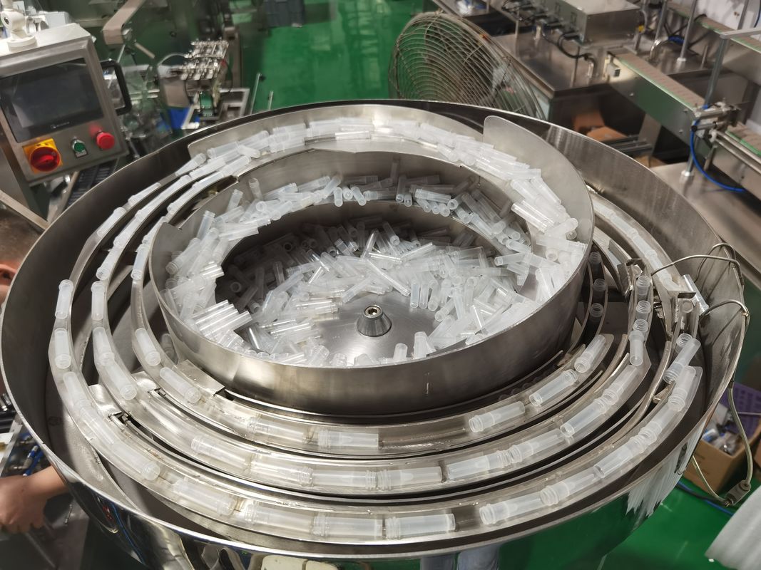 Voorwaarde Hoge snelheid Intelligente cap-feeder voor reagens productielijn nauwkeurige voeding