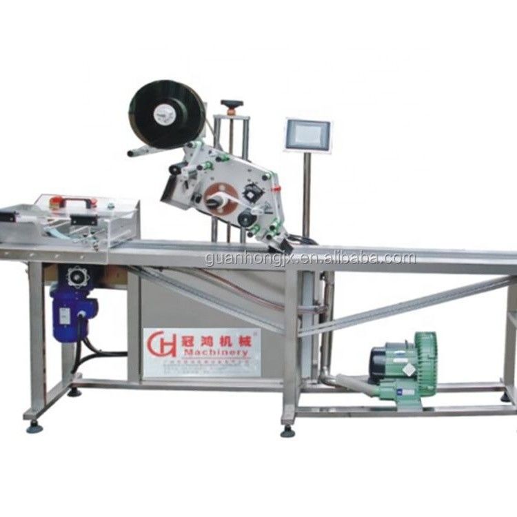 Hoogproductieve automatische pagina-etiketteringsmachine met video en foto's van Guan Hong