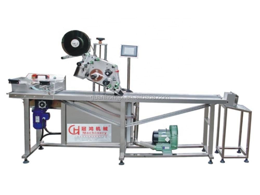 Hoogproductieve automatische pagina-etiketteringsmachine met video en foto's van Guan Hong